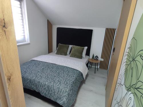 Studio apartman Čolićにあるベッド