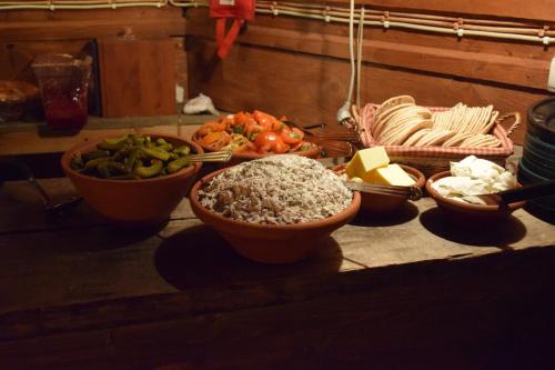 a group of bowls of food on a table at Serena Villas in Espoo