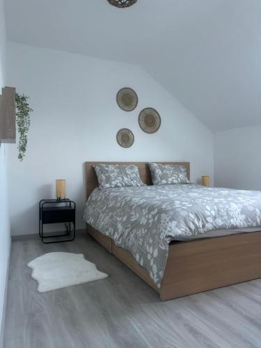 Una cama o camas en una habitación de Rêv'Appart2
