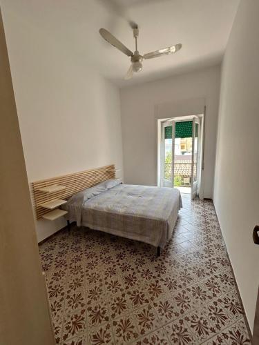 Postel nebo postele na pokoji v ubytování Casa Olimpia