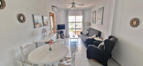 Apartamento con terraza en primera línea de playa