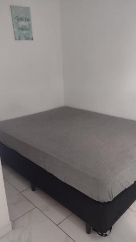 Postel nebo postele na pokoji v ubytování Santos house casa com dois quartos