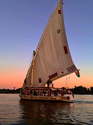 Aswan Felucca sailing boat and Hotel