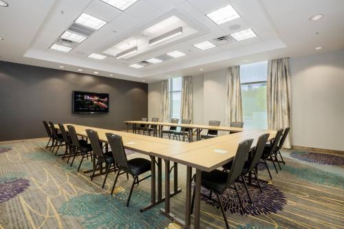 a conference room with a long table and chairs at Residence Inn by Marriott San Jose Airport in San Jose