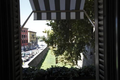 a view of a street from a window at Il Relais in Verona