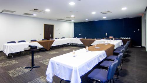 a conference room with tables and chairs in it at Holiday Inn Express Mexico Santa Fe by IHG in Mexico City