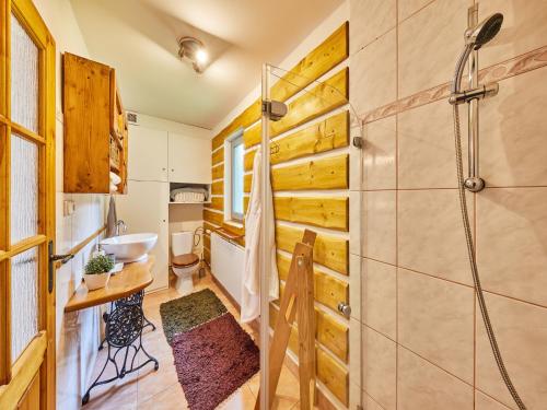 a bathroom with a shower and a sink at Villa in Jablonec with Sauna & Hot Tub in Albrechtice v Jizerských horách