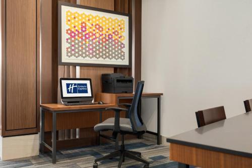 an office with a desk with a computer on it at Holiday Inn Express & Suites - Dalton - Walnut Ave by IHG in Dalton