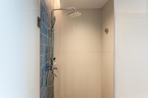 Ένα μπάνιο στο Holiday Inn Express Haikou World Trade Center by IHG