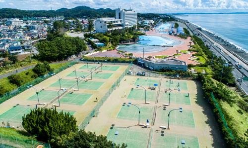 an aerial view of a city with tennis courts at Oiso Prince Hotel in Oiso