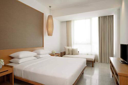 Letto o letti in una camera di Hyatt Regency Danang Resort and Spa