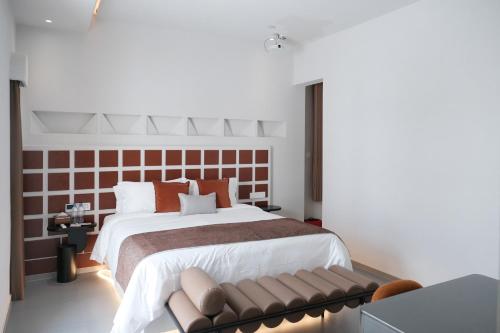 Katil atau katil-katil dalam bilik di YOOOO SEA TRUE REST Hotel