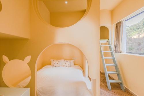Katil atau katil-katil dalam bilik di YOOOO SEA TRUE REST Hotel