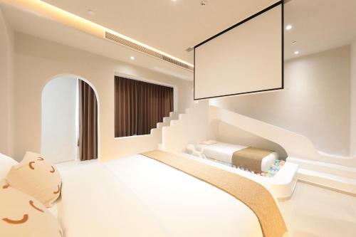 Katil atau katil-katil dalam bilik di YOOOO SEA TRUE REST Hotel