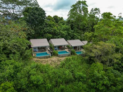 an aerial view of a house in the woods at Celestial Hills - Villas & Suites by The Clarks in Kandy