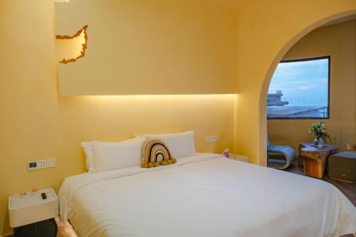 Katil atau katil-katil dalam bilik di YOOOO SEA TRUE REST Hotel