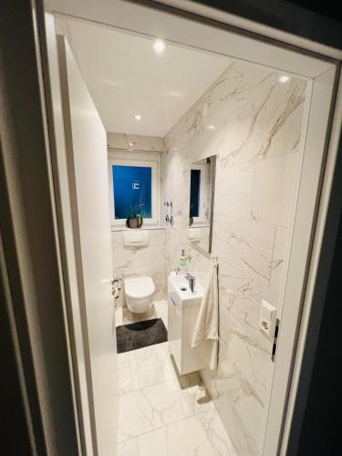 Ένα μπάνιο στο Schöne Ferien Wohnung in Breisach 3 Zimmer