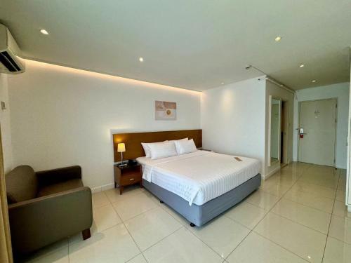 Katil atau katil-katil dalam bilik di Thomson Hotel Huamark