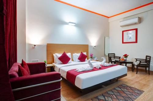 Postel nebo postele na pokoji v ubytování Hotel Noida Express