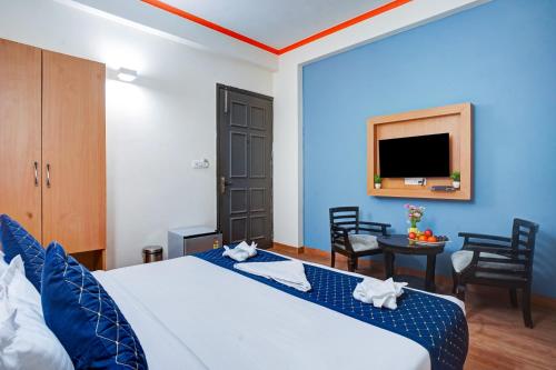 Postel nebo postele na pokoji v ubytování Hotel Noida Express