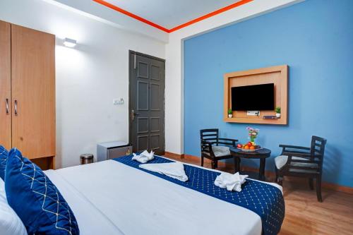 Postel nebo postele na pokoji v ubytování Hotel Noida Express
