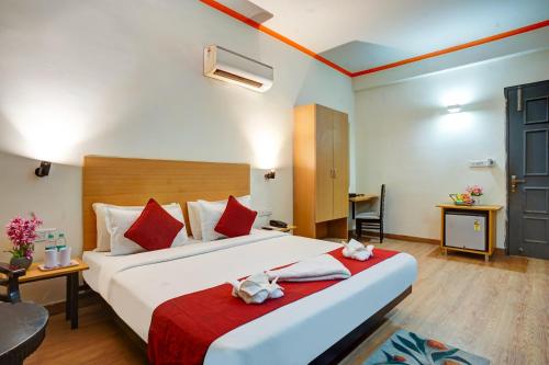 Postel nebo postele na pokoji v ubytování Hotel Noida Express