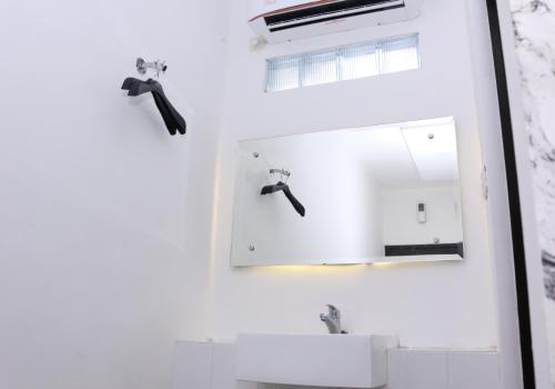 Koupelna v ubytování Trion Homestay Syariah