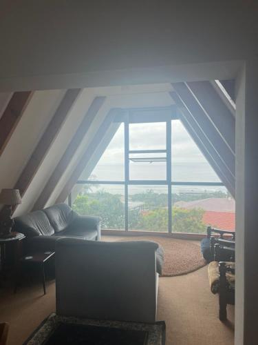 Ruang duduk di Laidback holiday home
