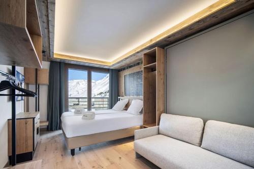 Chalet Hôtel Quartzにあるベッド