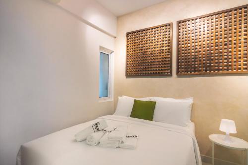 Postel nebo postele na pokoji v ubytování Maritime Suites by Stellar ALV