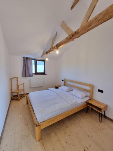 a bedroom with a bed in a room with a window at Guest house in Dilijan , whole apartment with 2 bedrooms in Dilijan