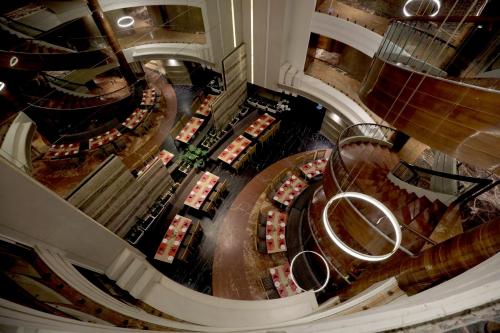 an overhead view of a large auditoriumasteryasteryasteryasteryasteryasteryasteryastery at Bizz The Hotel in Rajkot