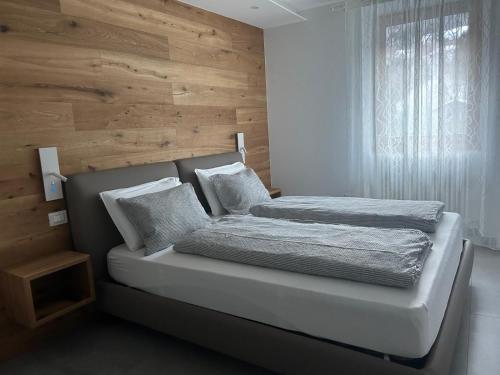 A bed or beds in a room at Casa Vacanze - Green Garden