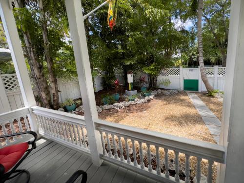 a view of a yard from a porch at Tropical Hideaway Tropical Village in Key West