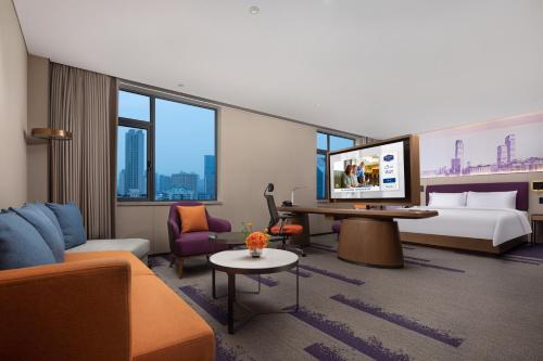 Hampton by Hilton Changsha Wuyi Squareにあるベッド
