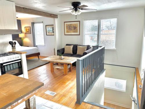 a living room with a couch and a table at 2br Townhouse Taft Stadium & Plaza Dining #n39 in Oklahoma City
