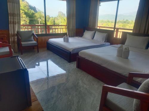 เตียงในห้องที่ DD guesthouse