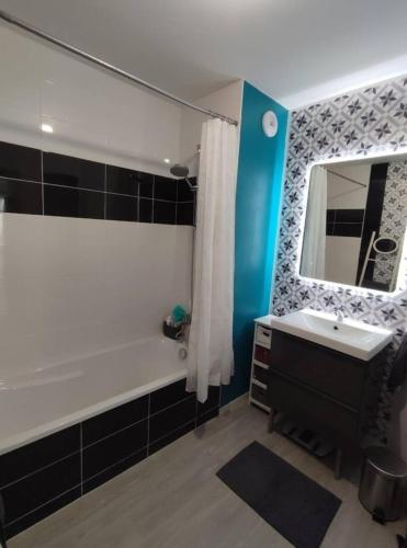 Ένα μπάνιο στο Chambre POUR FEMME