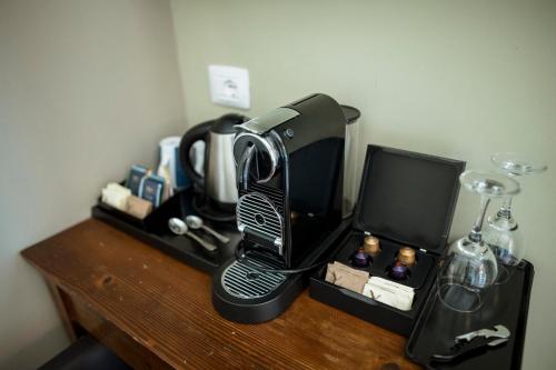 Le Greghe Suitesにあるコーヒーまたはお茶