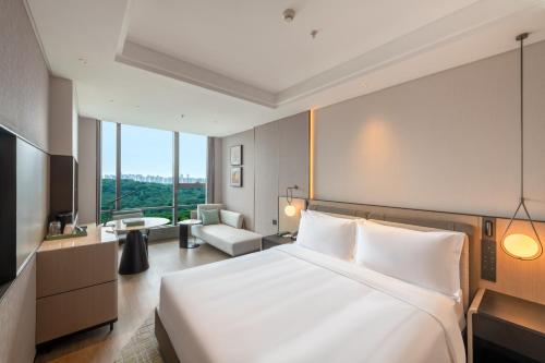 Fotografie z fotogalerie ubytování Nanjing Yangzi River Conference Center Longshan Lake Hotel v destinaci Nan-ťing