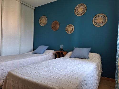 Postel nebo postele na pokoji v ubytování Les Louchardes