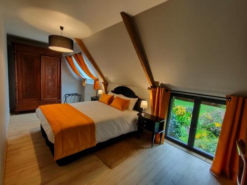 Postel nebo postele na pokoji v ubytování Gite Le Rucher et Gite appartement La Ruchette