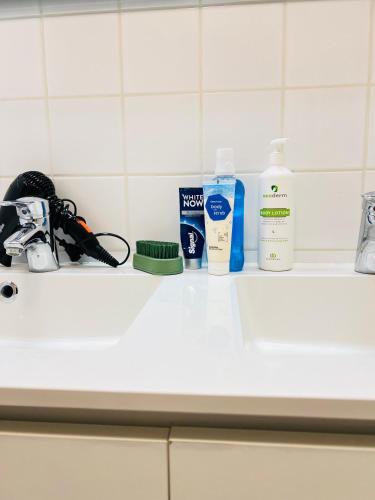 a white counter with bottles of soap and other items on it at visit Brussels city in Brussels