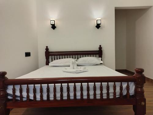 Кровать или кровати в номере Haira cottage