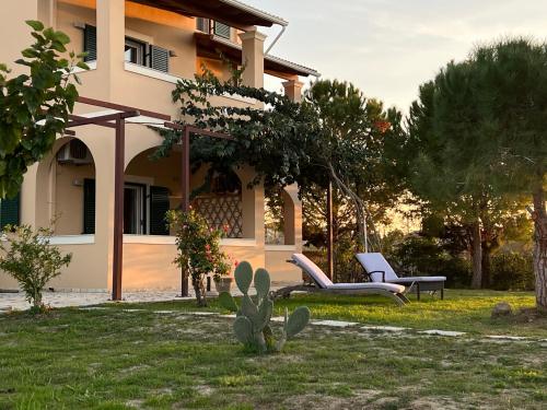 Zahrada ubytování Dimitra Houses - Seaside