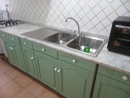 A kitchen or kitchenette at Casa Repasi