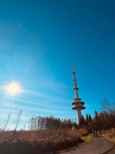a tall tower in the middle of a road at Ferienwohnung Schönheit in Gönnern