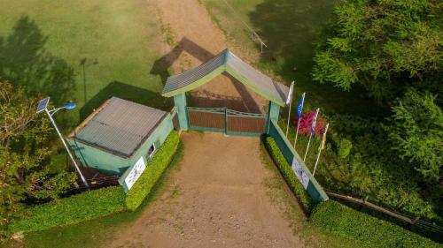 an overhead view of a small building in a field at Rusinga Island Lodge in Mbita