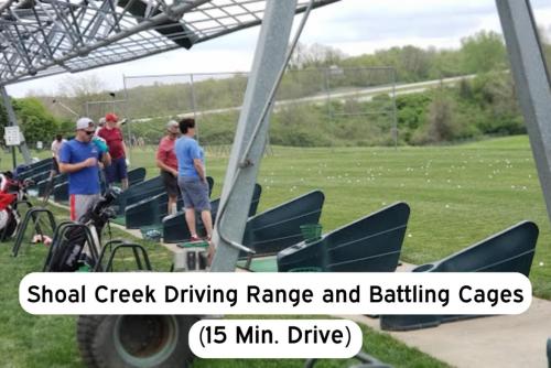 a group of people standing around a small airplane on a field at Classy 2BR-Parking, Rooftop,Near Arrowhd & TMobile in Kansas City
