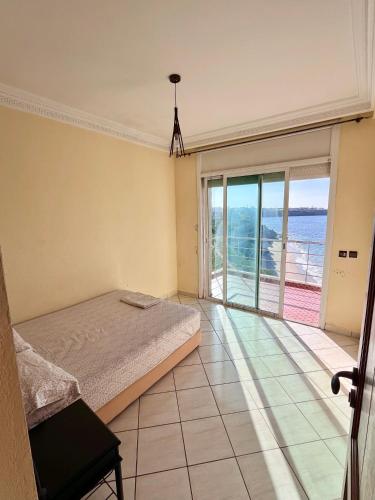 Ένα ή περισσότερα κρεβάτια σε δωμάτιο στο OceanView Villa - 5 Bedrooms on the beach